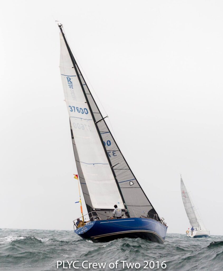Sailboats racing on rough ocean waves