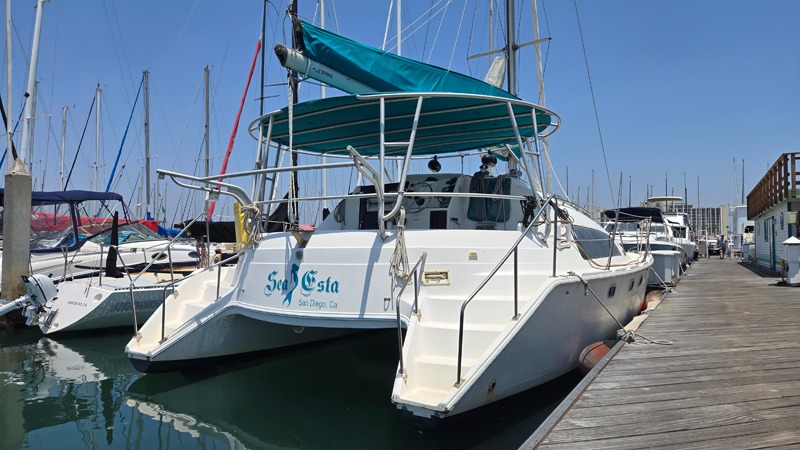 Catamaran docked at marina in San Diego