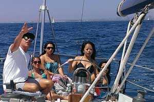 Group sailing on a boat in the ocean