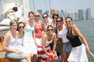 l-300x200 Group of friends smiling on a boat trip