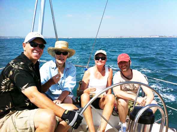 Group sailing on a sunny ocean day
