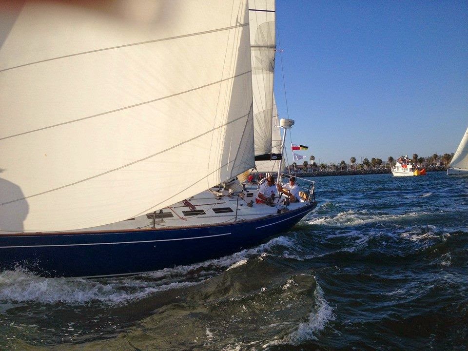 Sailboat racing on sunny ocean waters