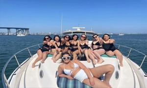 Group of women relaxing on a yacht at sea
