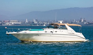 White luxury yacht cruising on blue ocean